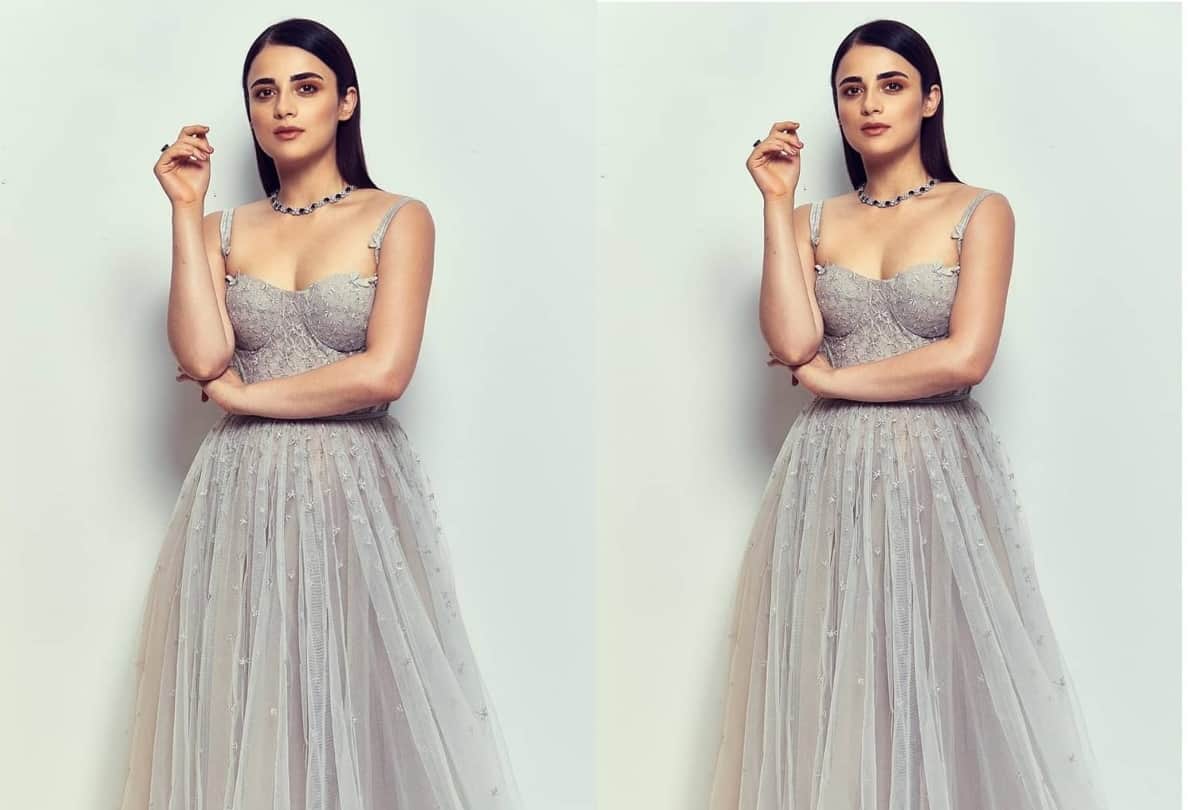 radhika madan mini skirt and sheer sweatshirt look perfect for rainy day