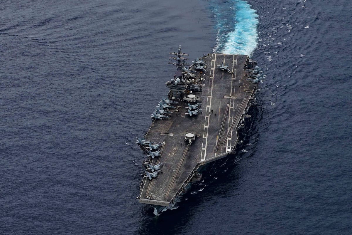 China adopting aggressive activities in South and East China Sea