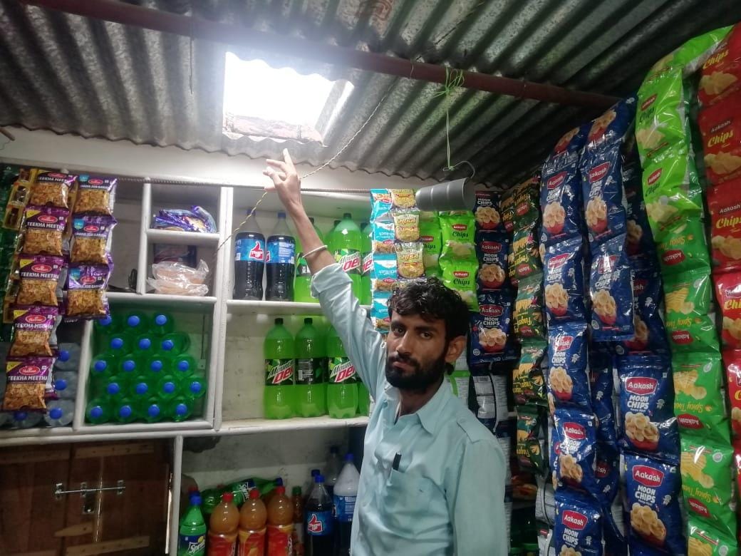 Theft of thousands in two shops, by cutting tin shed in one and enter