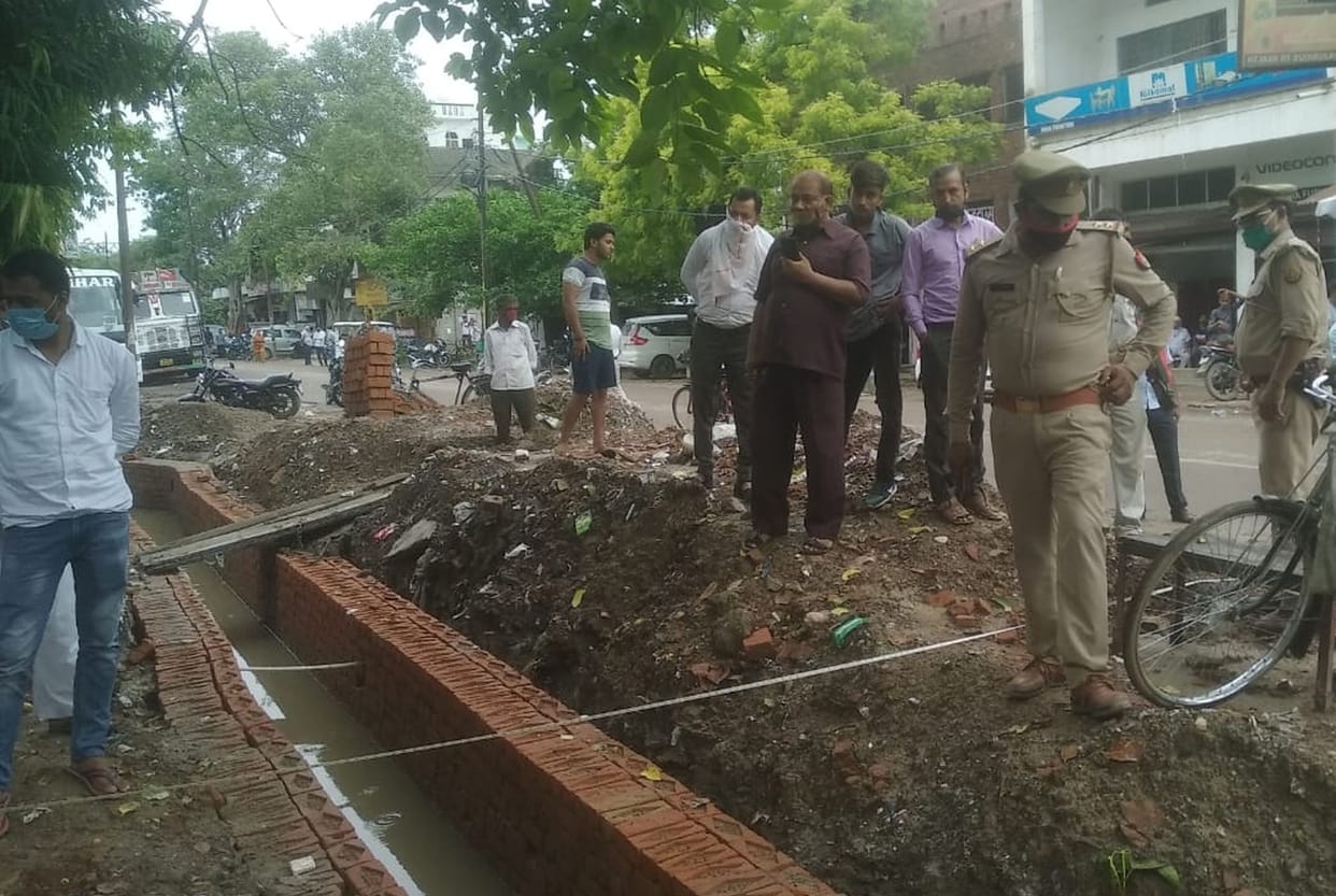 Traders created ruckus, excavated drain again