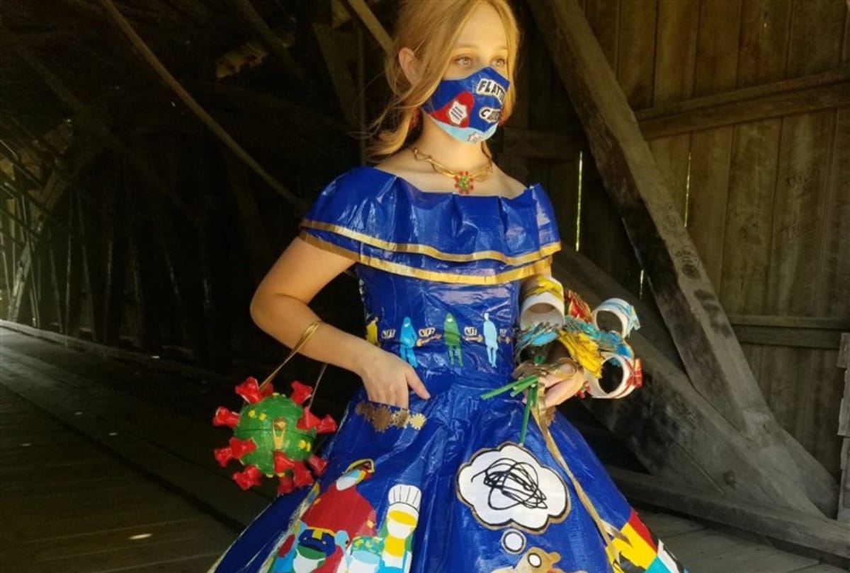 teen age girl make prom dress with help of tape and design coronavirus impact on people