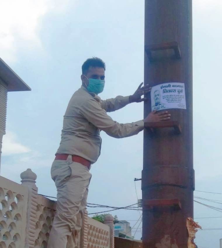 Hathras: Police pasted posters in Sadabad to search for Vikas Dubey