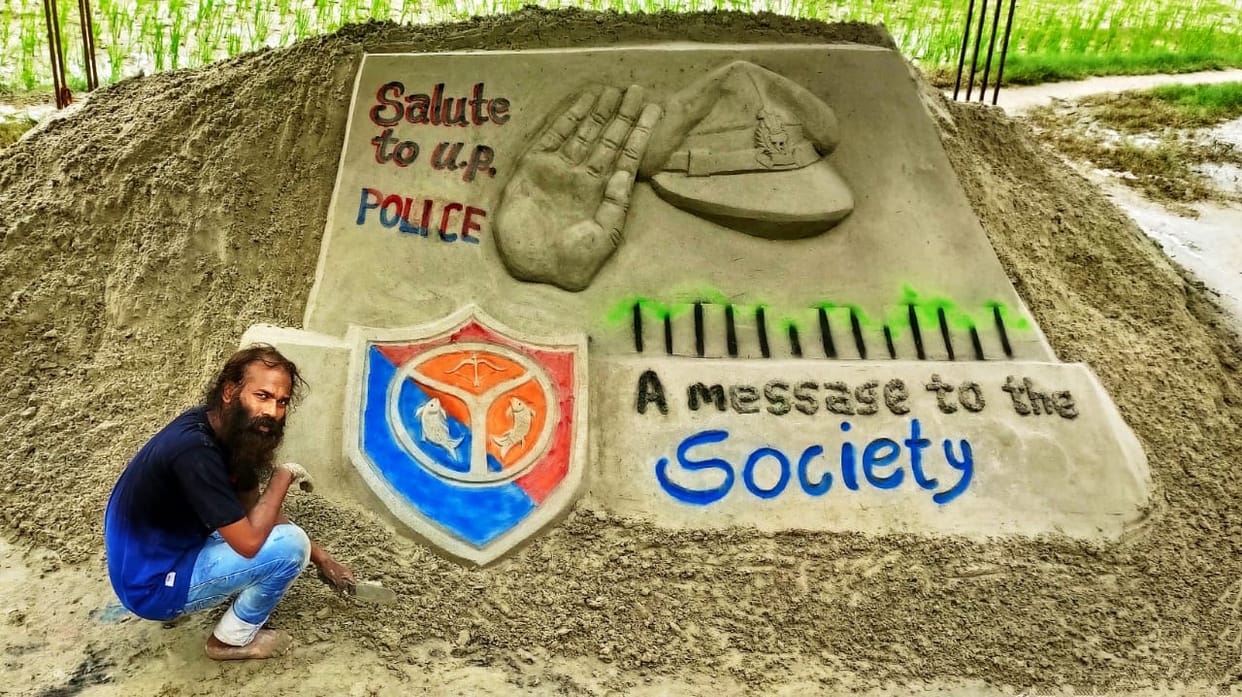 Salute to UP Police on encounter, Sand Artist portrays police engraved on sand