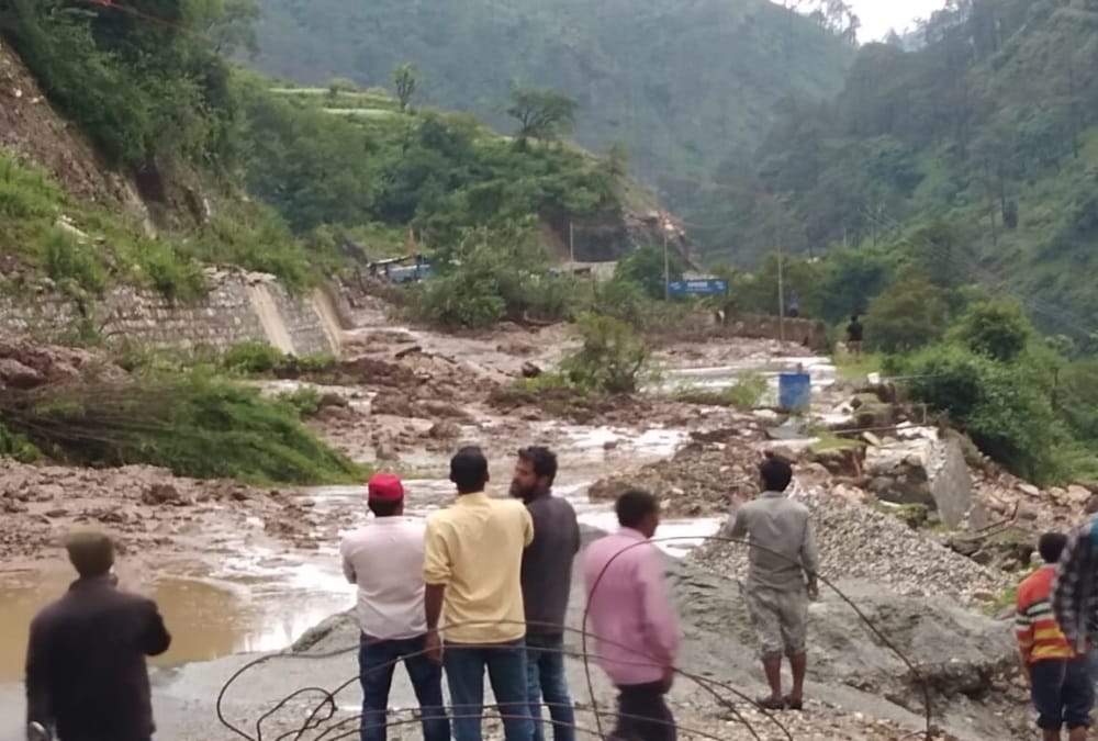 Uttarakhand Weather update: Car swept in overflow canal, Stones and debris fall on badrinath highway