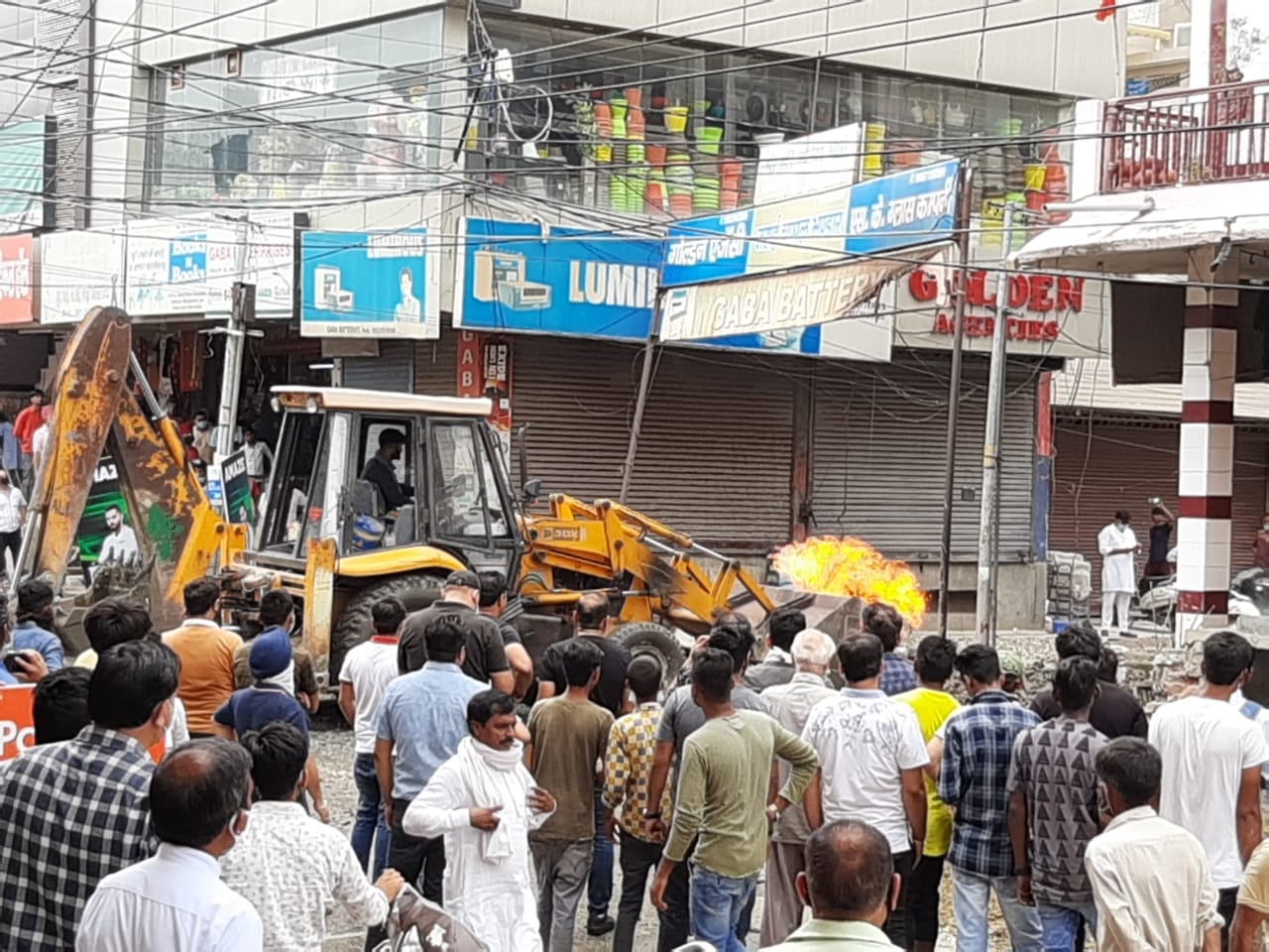 JCB machine was Digging fire flames suddenly started coming out from ground