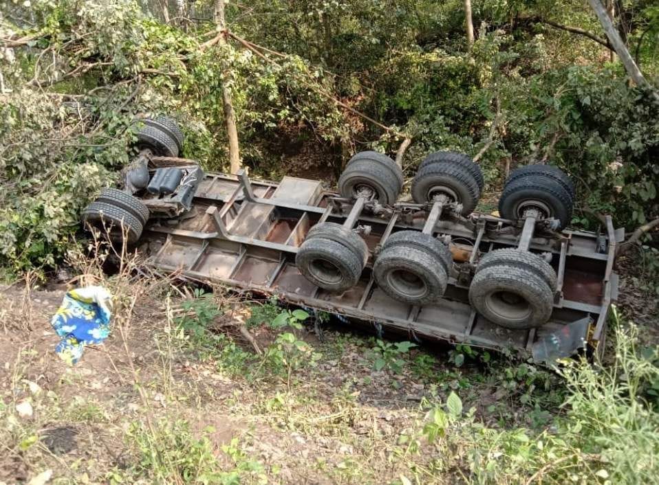 Truck falls into pit while delivering side, driver injured