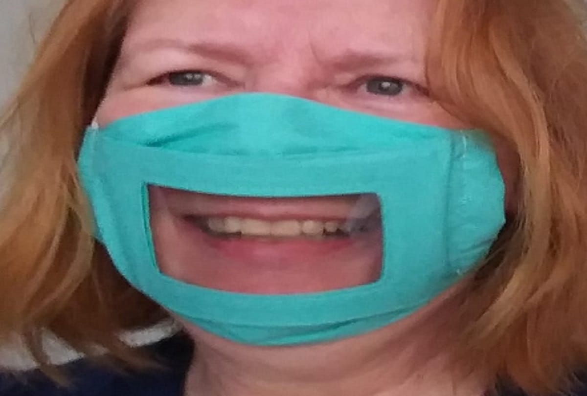 Coronavirus prevention England Woman Make 100 Transparent Mask For People Who Can not Hear