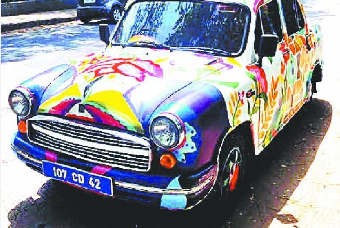 Artistic work on vehicle is not grounds for refusal of its registration: High court