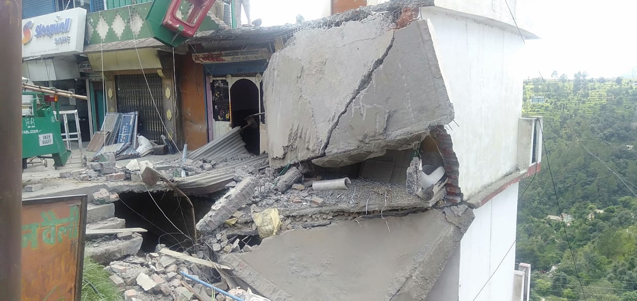 The upper part of the four-storey house collapsed