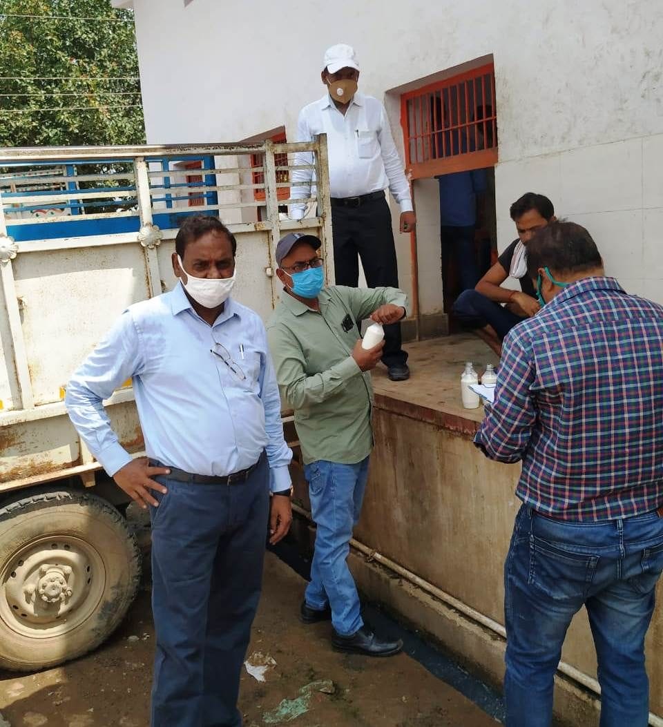 food safety team collect sample from dairy