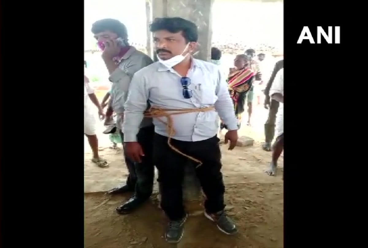 Telangana Medak village Resident tied Electricity Department officials to a pole