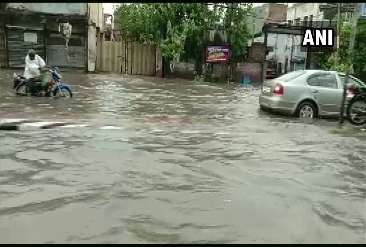 Heavy rain in Delhi DTC bus drowns at minto bridge see pictures