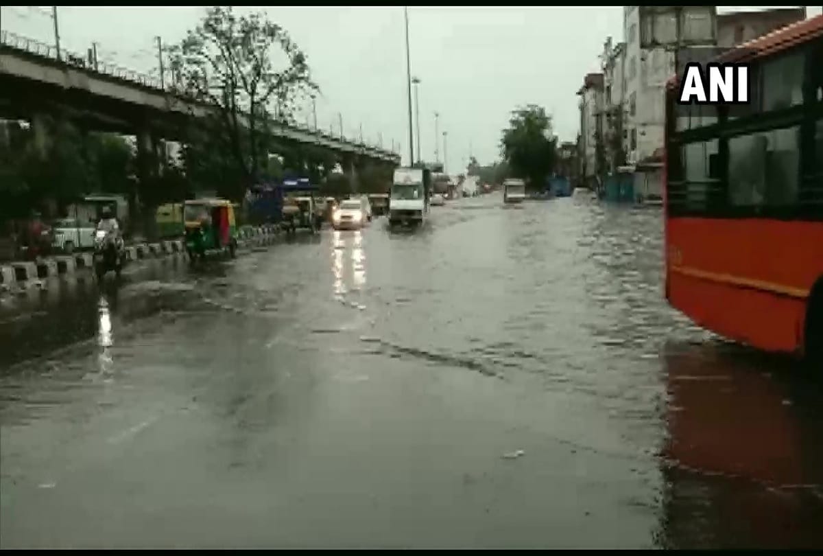 Heavy rain in Delhi DTC bus drowns at minto bridge see pictures