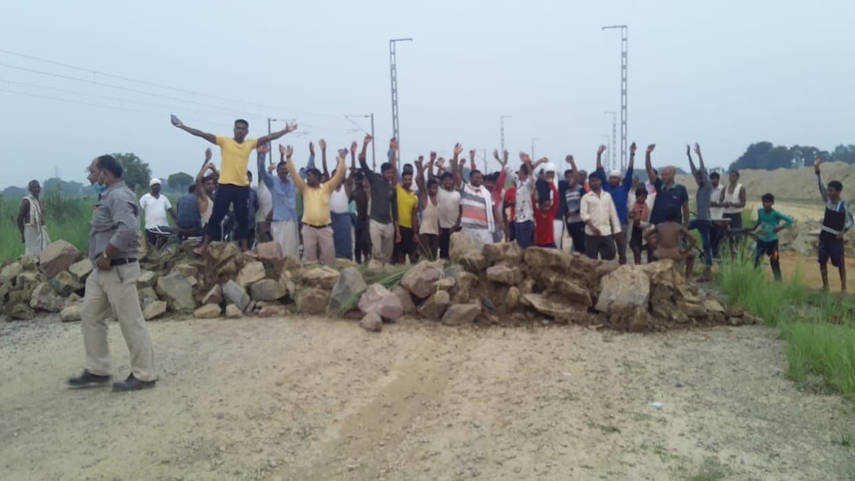 Villagers protest for railway underpass in Kokhraj