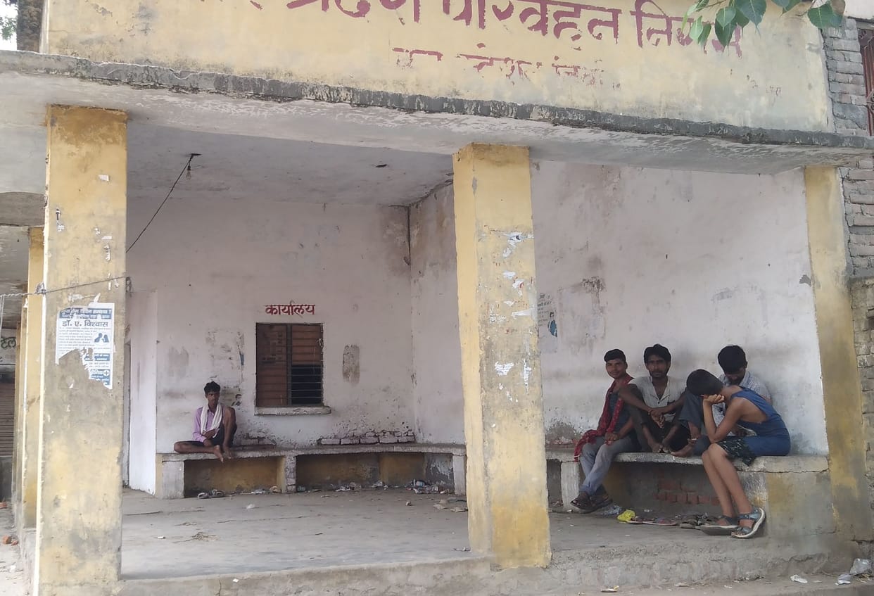 passengers at bus stop