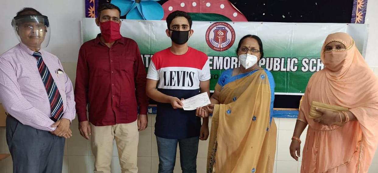 Mandal Topper honored in school