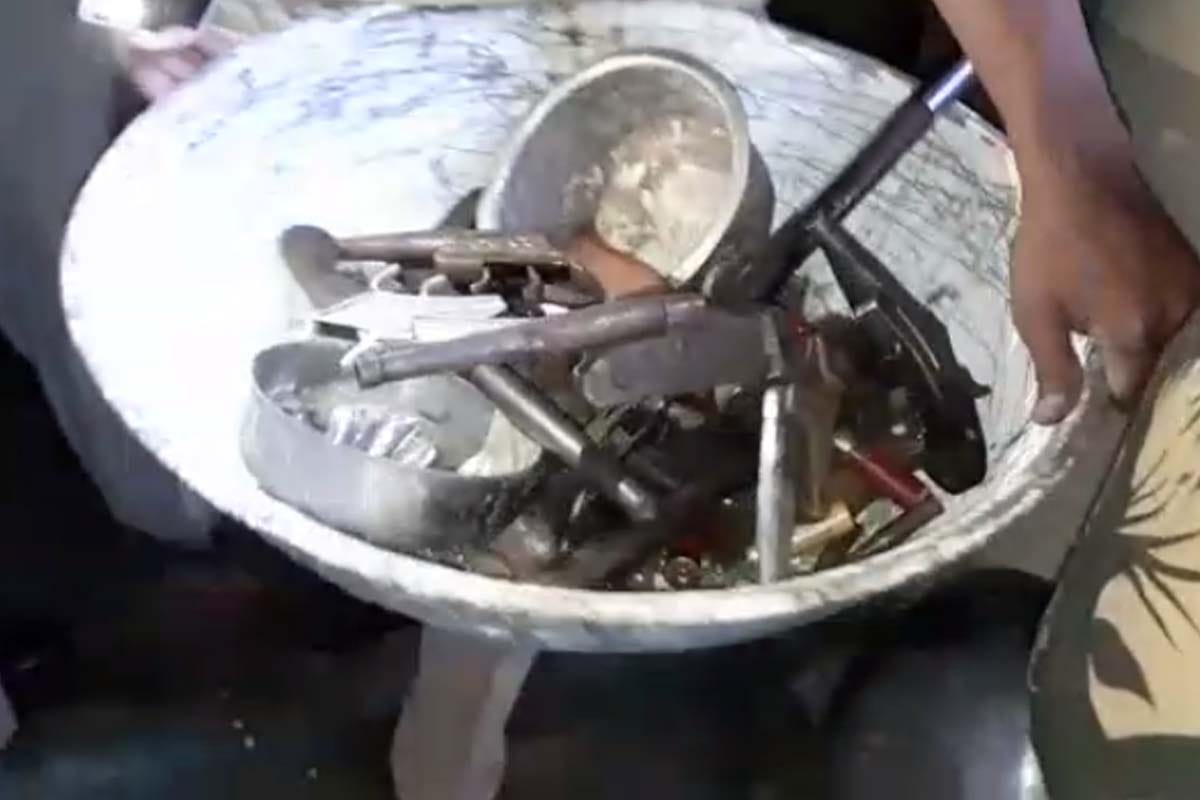 police and STF raid at Yogesh Bhadora and Udham Singh house in meerut, illegal weapons recovered