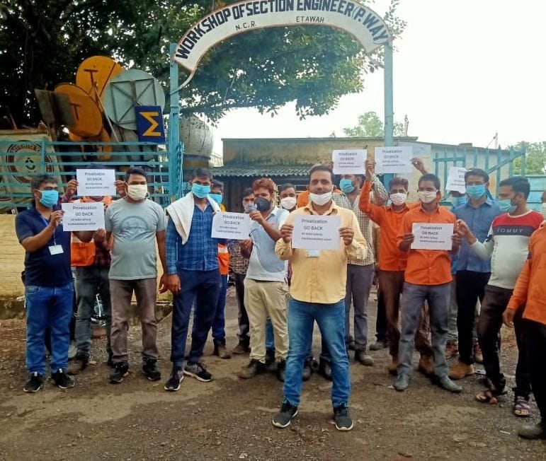 Protest against the privatization of railways by tying black band