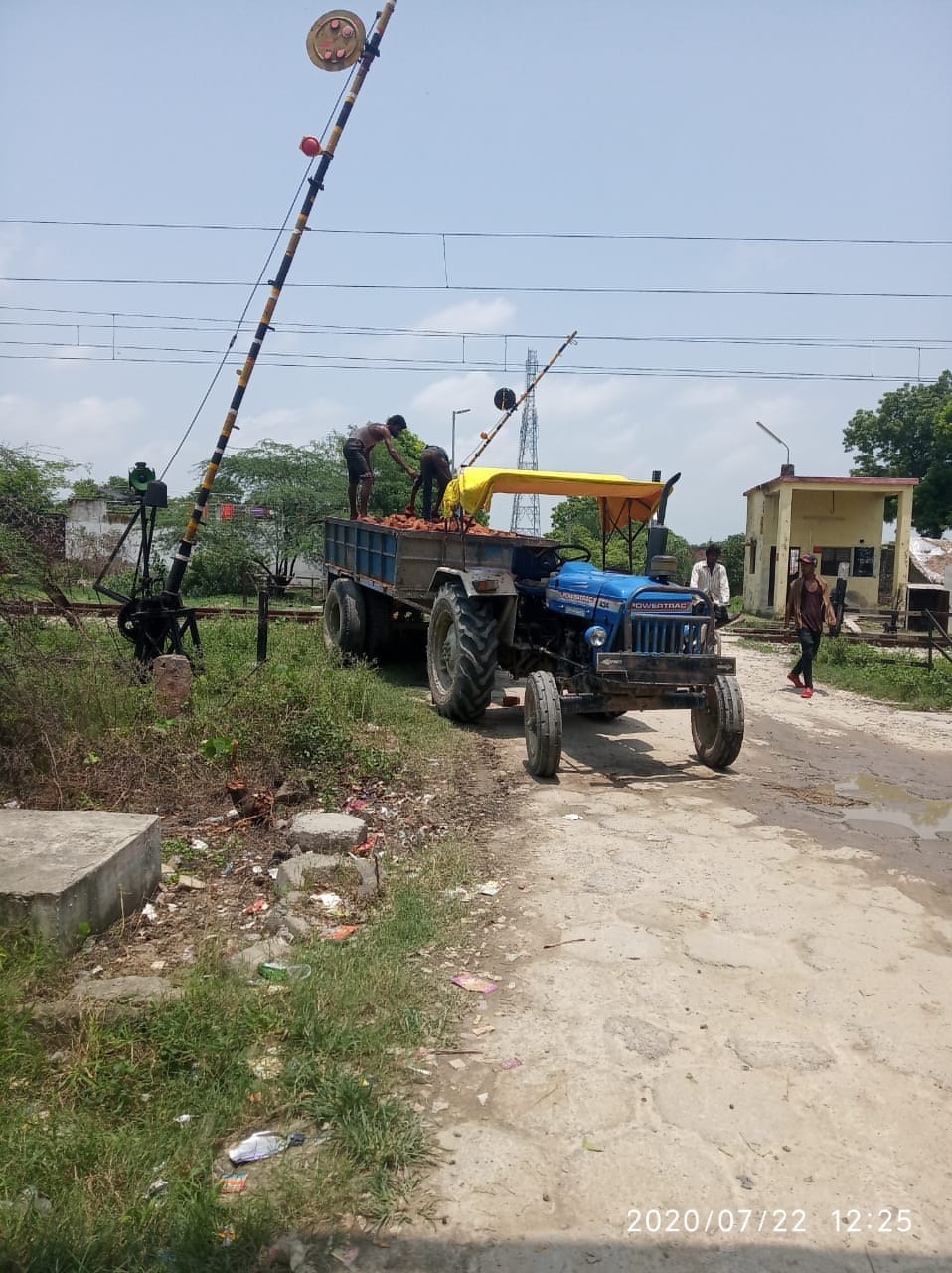 Tractor stuck at the gate between Janghai-Neebhapur Railway