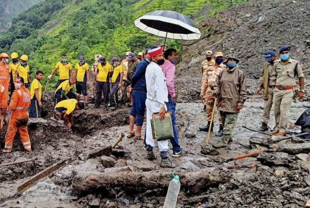Dead bodies of two women taken out of debris