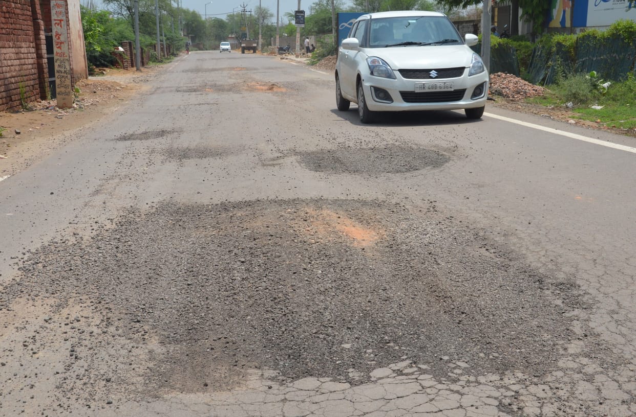 Road broken in first rain.
