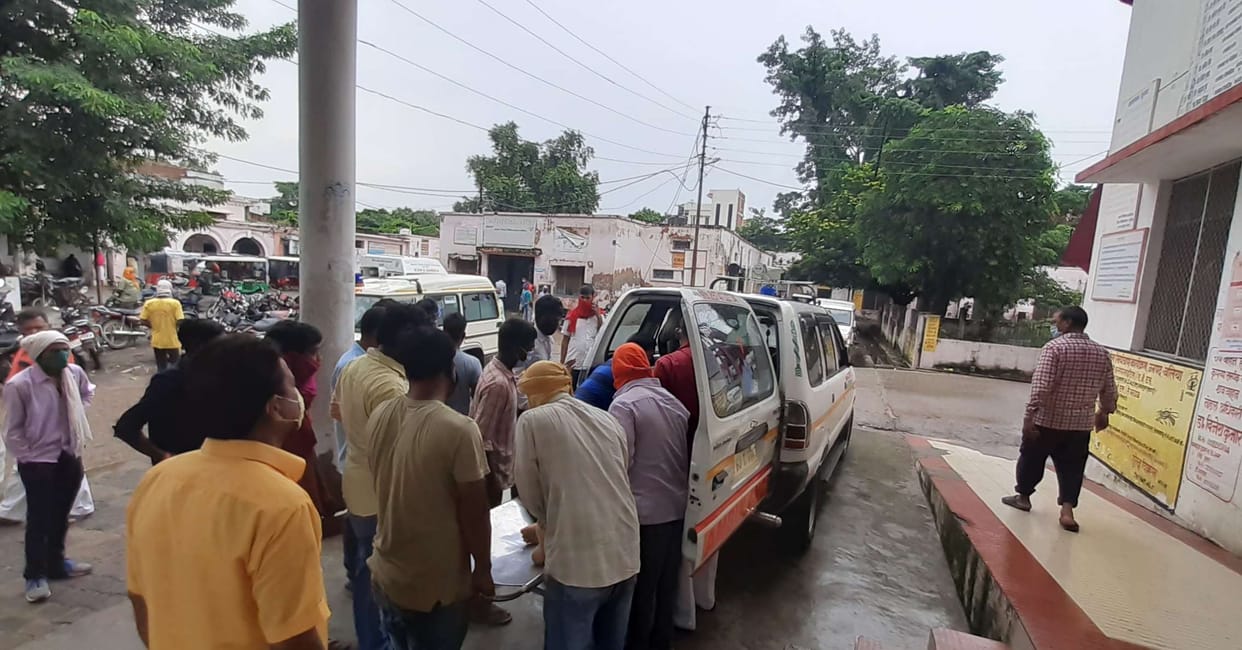 Violence over pouring rain water, 11 injured from both sides