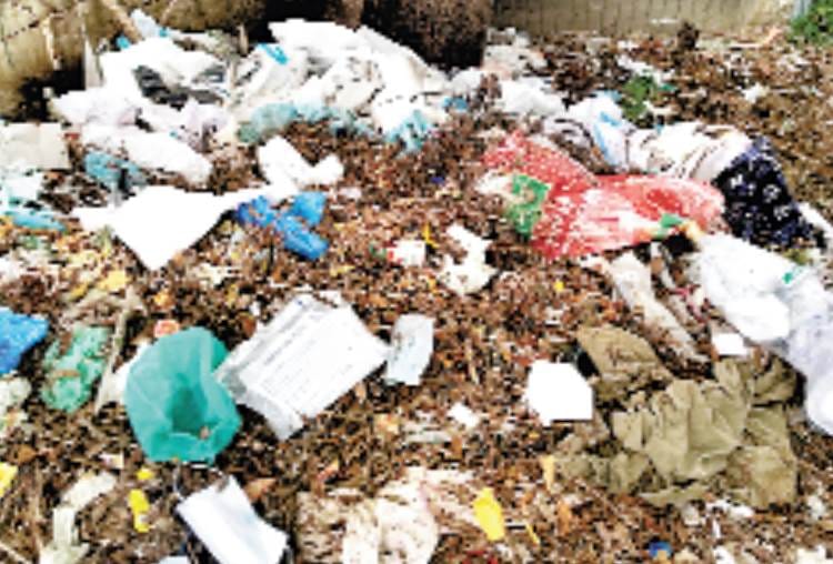 violation of corona protocol at baikunth dham, PPE kits are thrown in open area