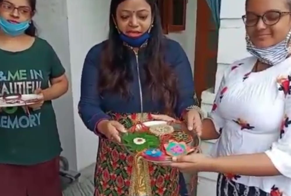 People are making rakhis at their home.