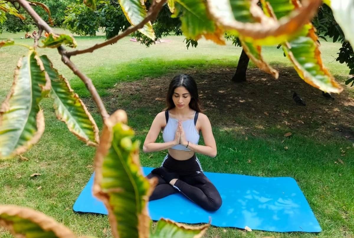 mouni roy pics latest doing yoga poses in garden glamorous look