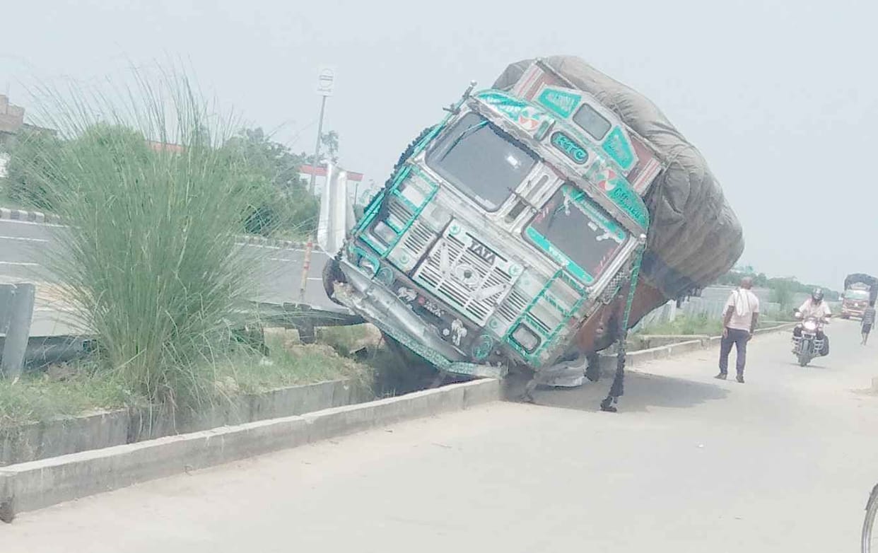 Chemical laden truck broke into divider after breaking dividers
