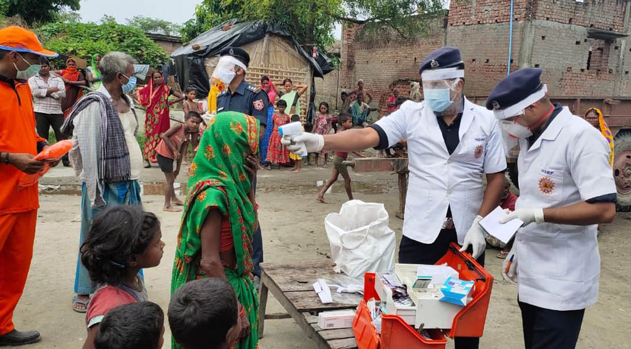 ndrf distributed medicines, awared about flood