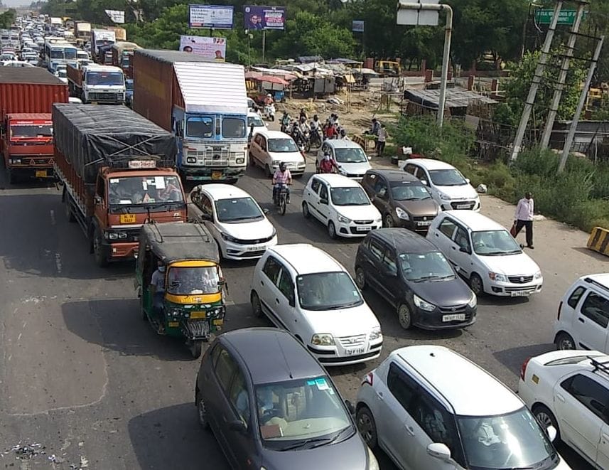 Bike collision injured due to collision with truck, bike jammed on highway after accident