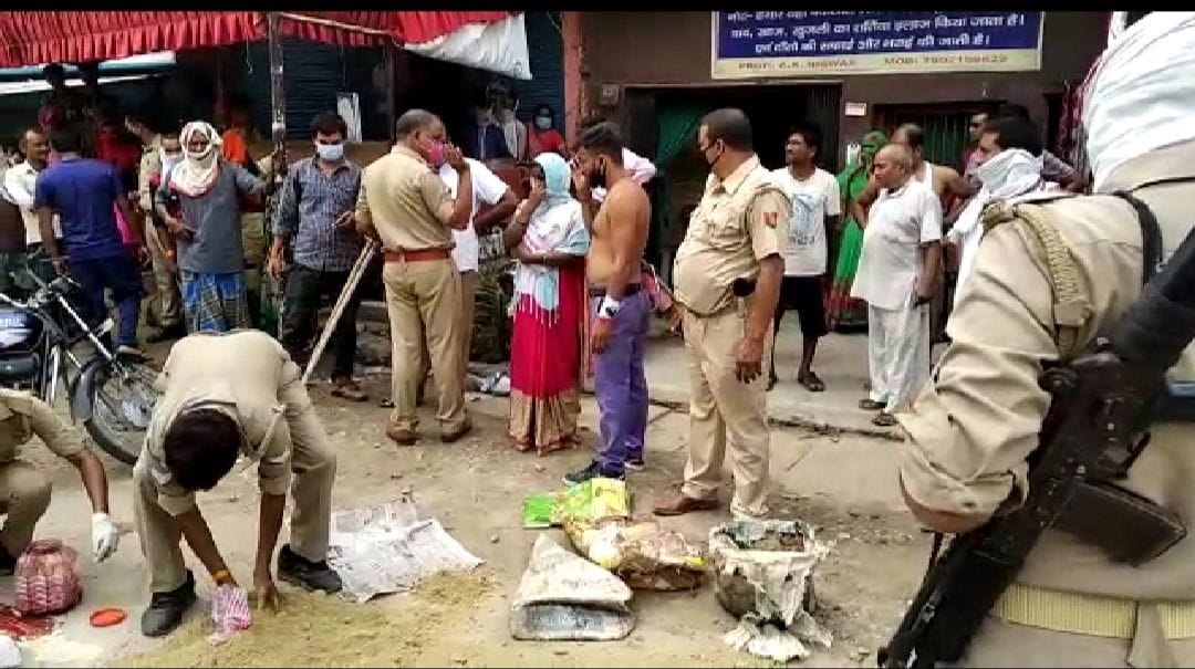 Woman dies after being hit by truck, husband injured