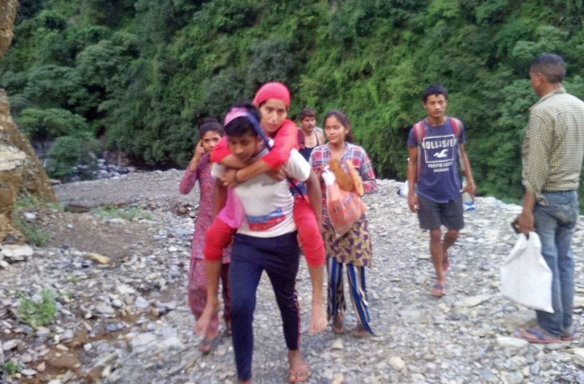 A sick woman was brought home from Doli by eight km