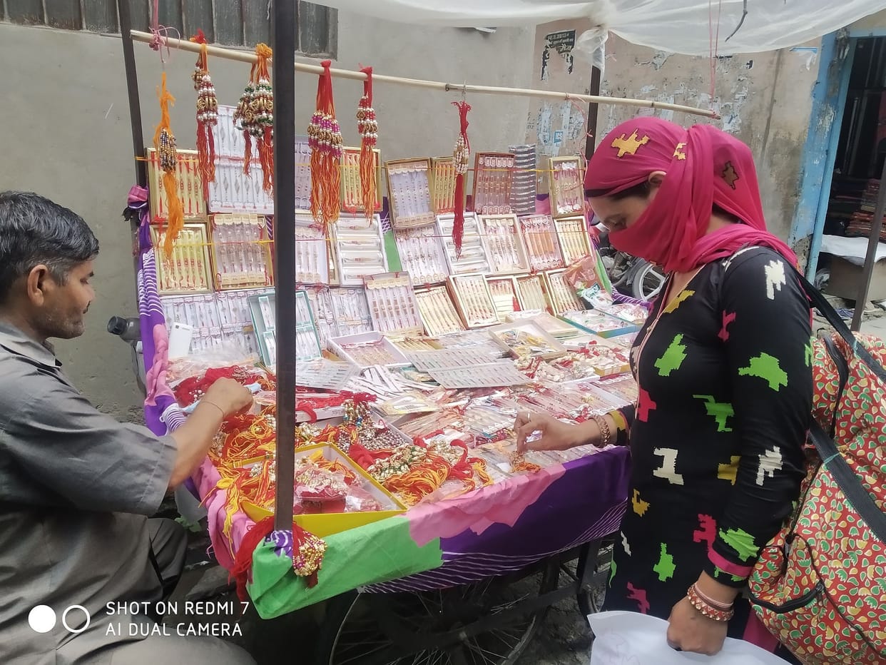 Women engaged in shopping for the sacred thread of brother-in-law amid Corona virus infection