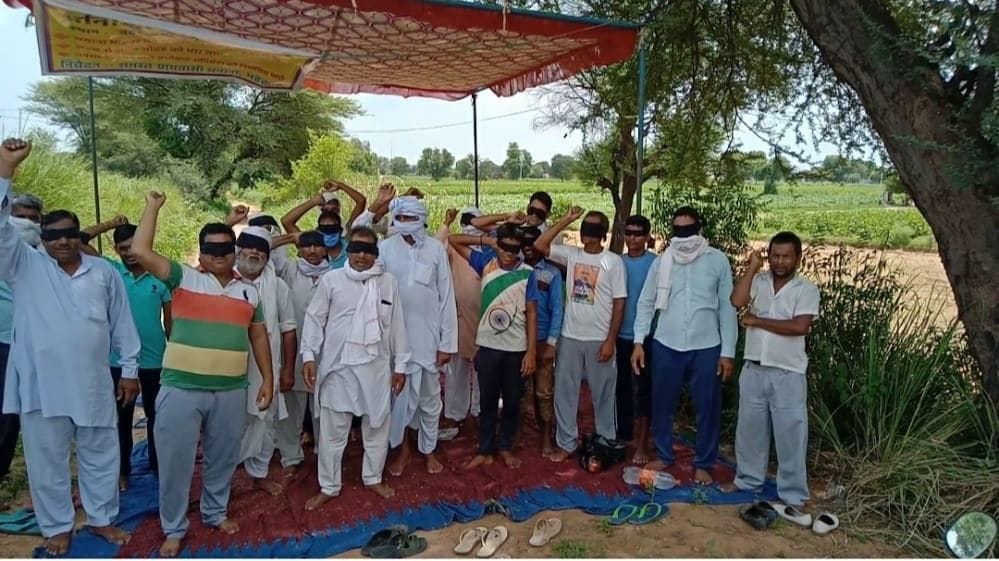 Villagers protested by wearing black bandage