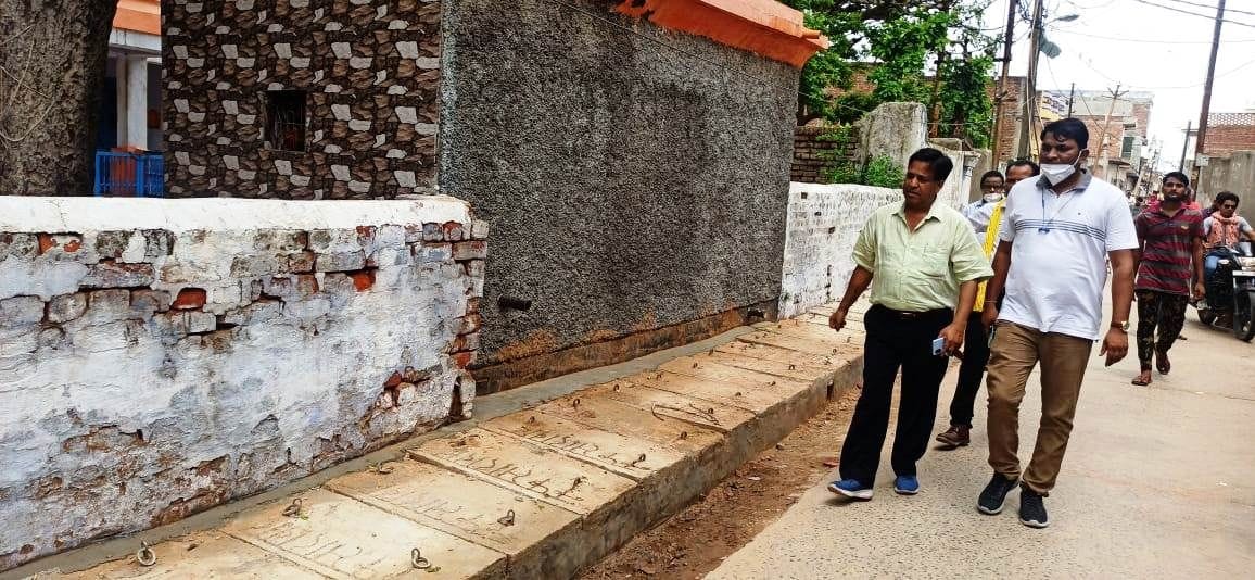 Chairman and EO inspection of drain
