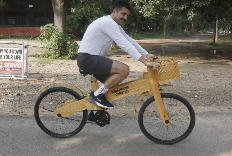 Cycling Craze: See picture of wooden bicycle