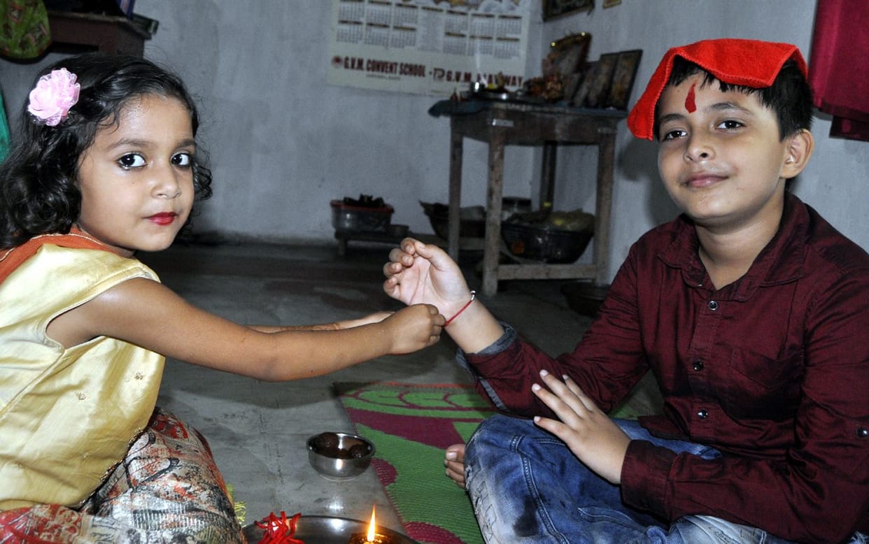 bahna tied a rakhi on her brothers wrist