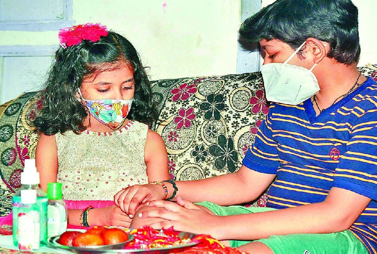 Corona Rakshasutra Tied On Wrist With Promise Of Wear Mask
