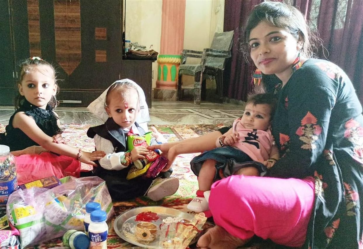 sister tie rakhi on brohters hand, they take oath to save her