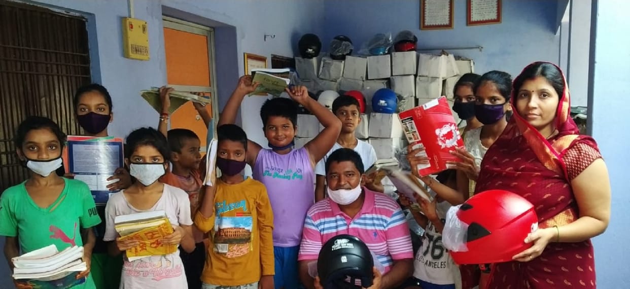Sisters give helmets to protect brother on Rakshabandhan's holy festival