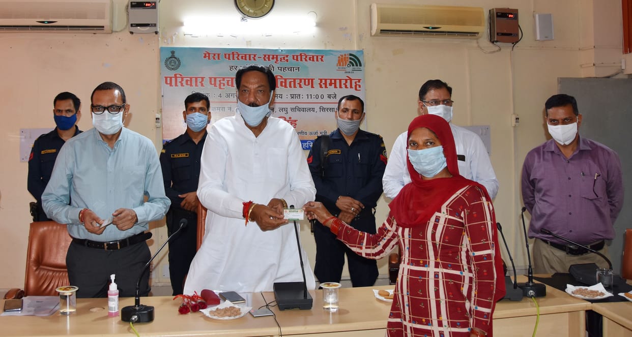 minister distribute ID card