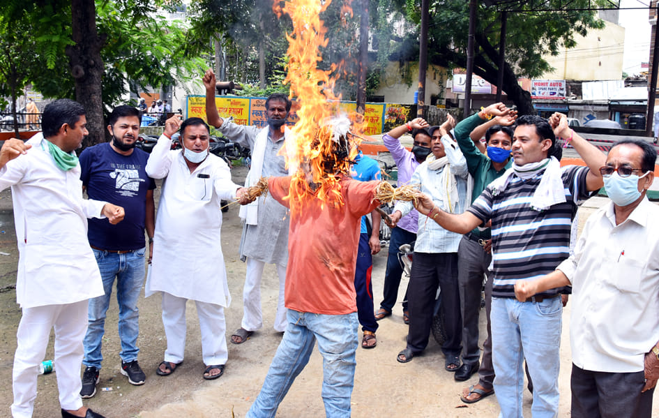 Protest expressed by burning effigy of school operators