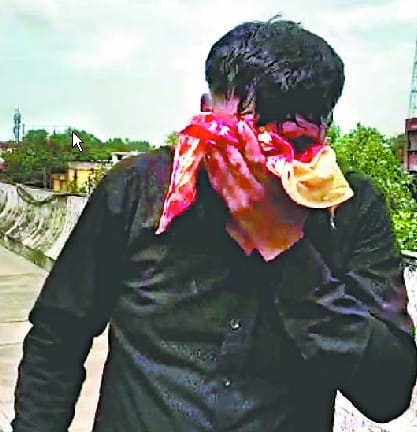 The neck of a young man severed from a Chinese man on the Chaupula Bridge