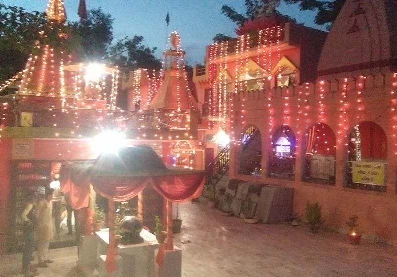 Temple illuminated by colorful lights, echoed Shriram Jayakare