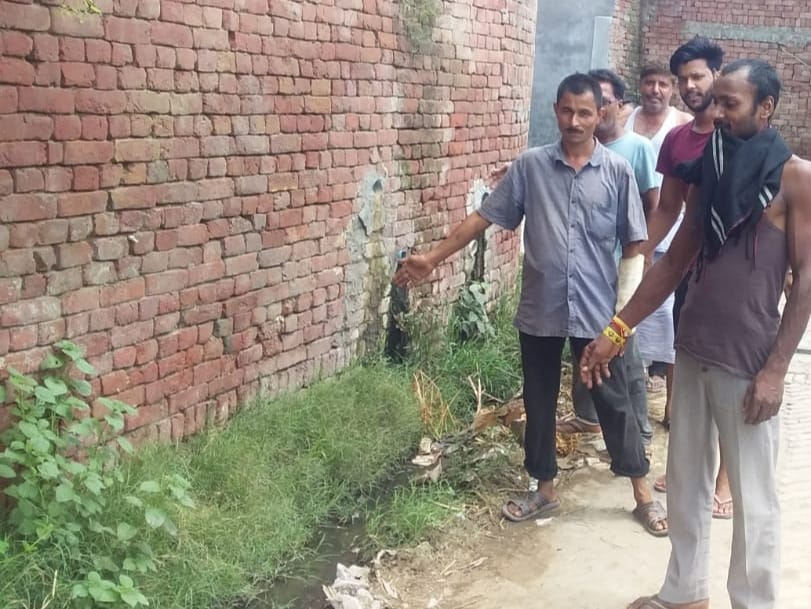 Villagers protest against the mess