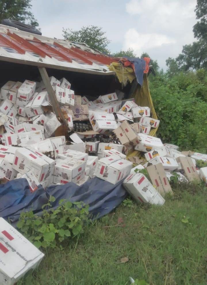 Trying to save animals overturned truck, driver injured