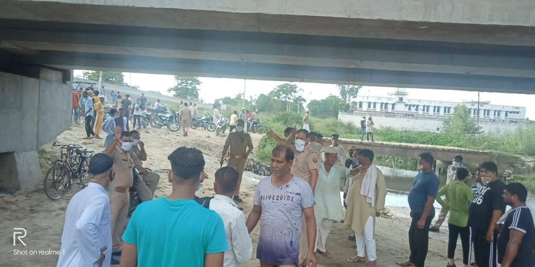 A young man caught in the river Kali while taking a bath