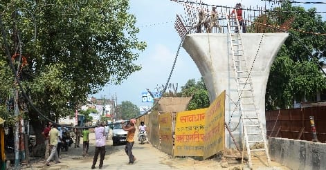 Pole removal work disrupts construction of Chaupula Bridge